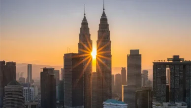 Sunrise behind Petronas Towers in Kuala Lumpur