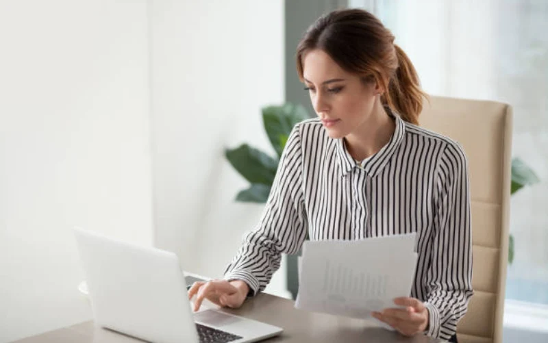 women checking if the malaysia visa is fake or original