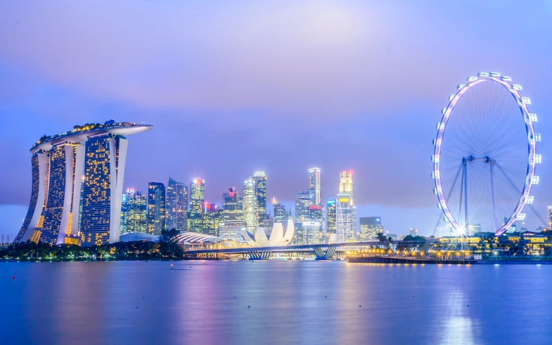 Singapore skyline at dusk with Marina Bay Sands and Singapore Flyer

